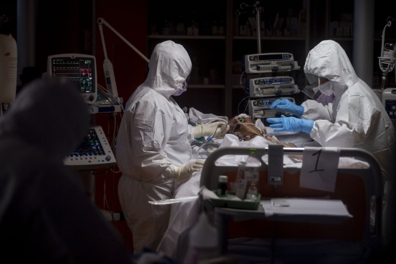Doctors treating COVID patient in hospital