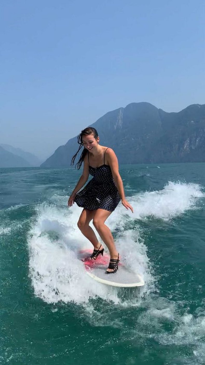 Cassandra Hildebrand surfing in heels.