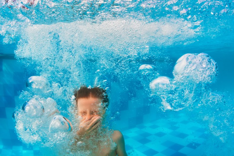 File photo of a boy swimming. 