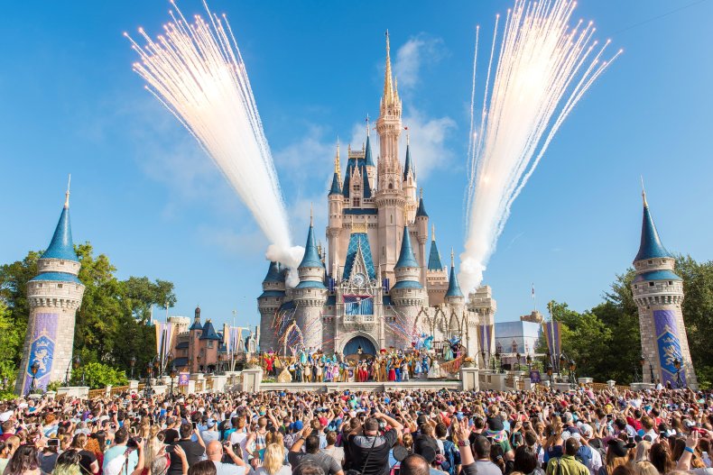 Disney World castle with crowd