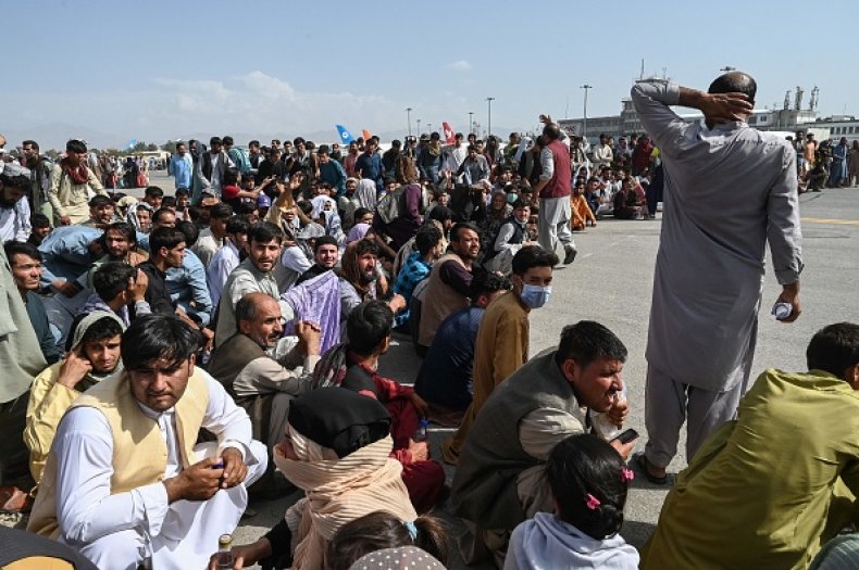 Afghan Passengers Kabul Airport Flee Taliban