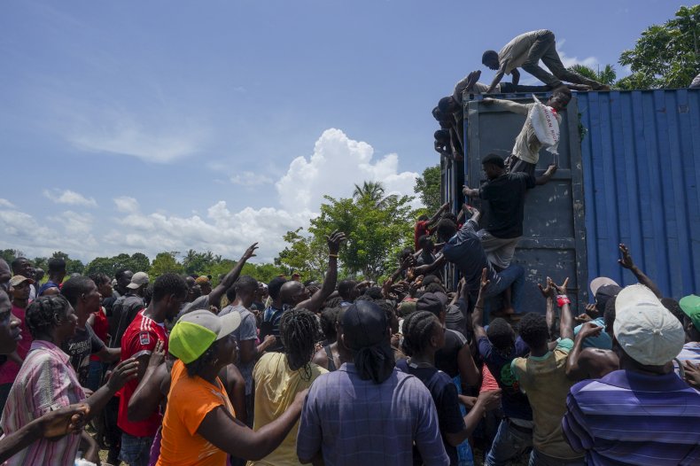 Haitians Loot Relief Truck