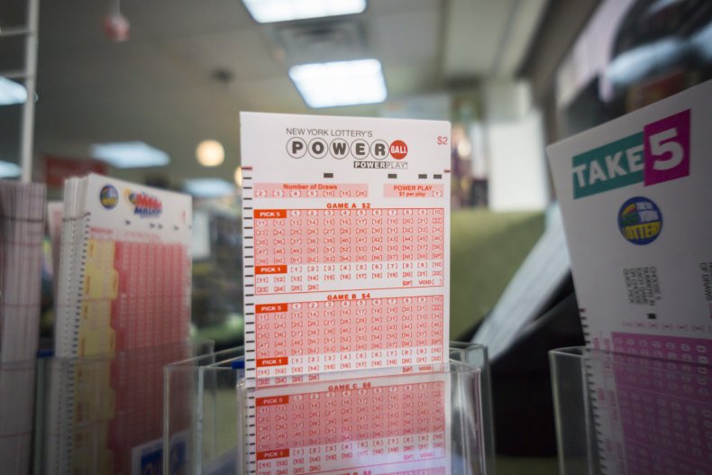 Powerball tickets on a convenience store shelf.