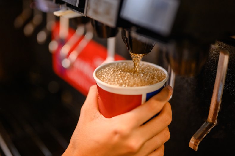 A soda being poured.