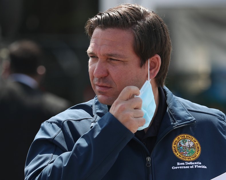 Florida Gov. Ron DeSantis Takes Off Mask
