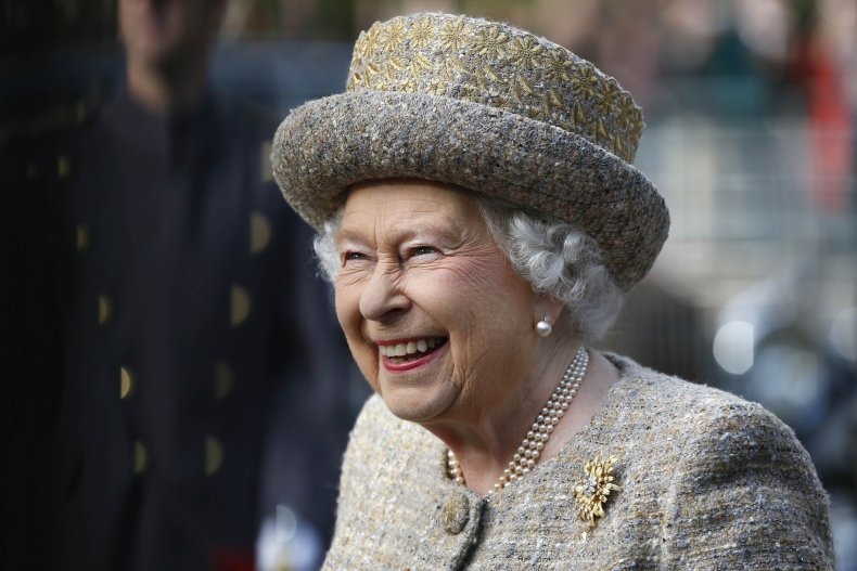Queen Elizabeth II cracks a smile.