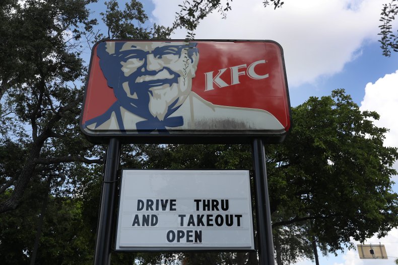 A KFC drive thru restaurant sign.