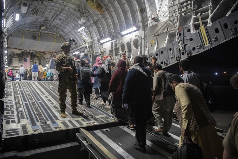 Afghans Evacuate Afghanistan on U.S. Aircraft