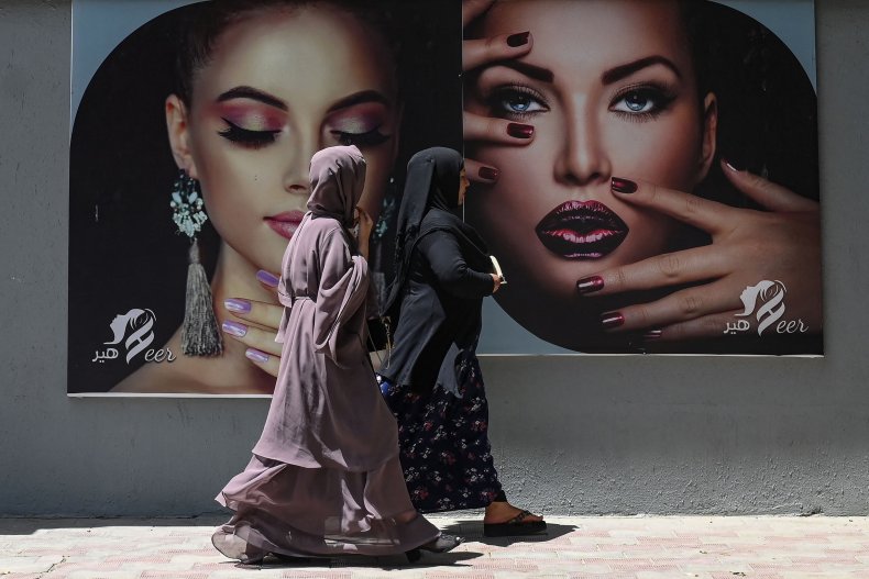 Women walk in Kabul