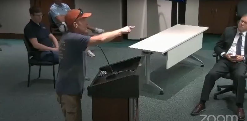 A Michigan man speaking angrily about masks.