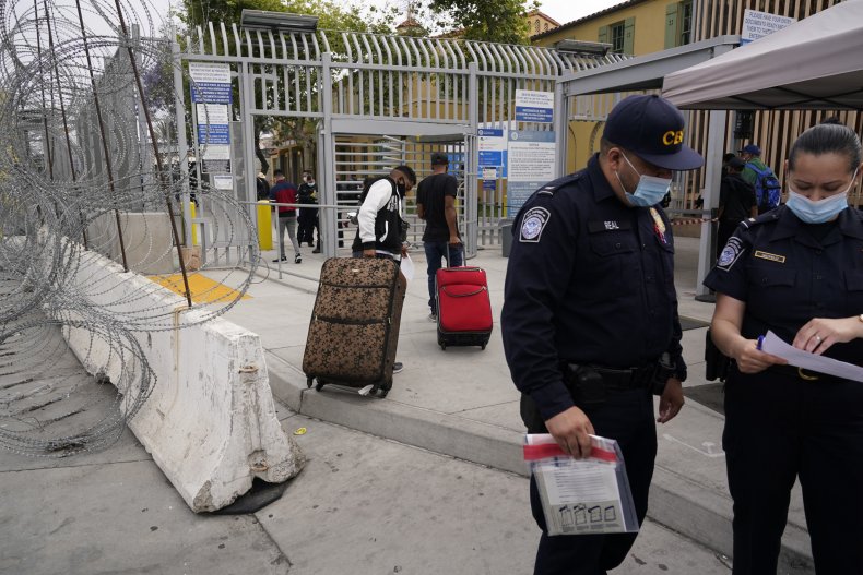 Asylum Seekers With Suitcases