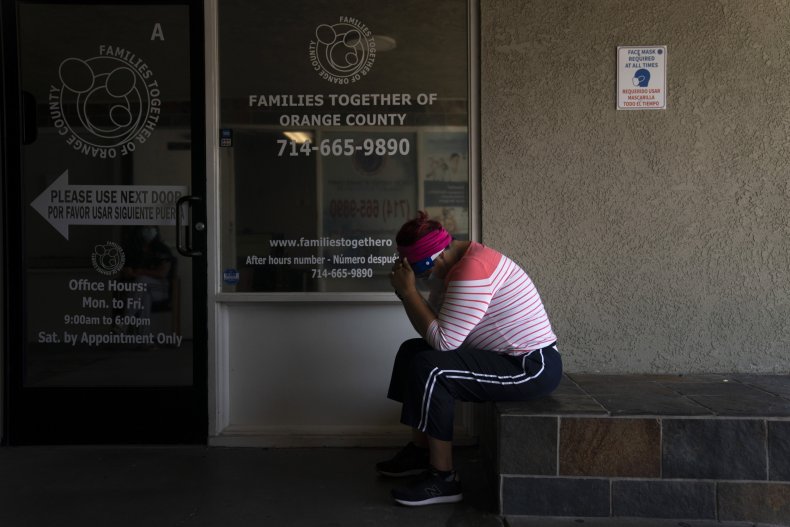 Woman waits for COVID-19 test in California