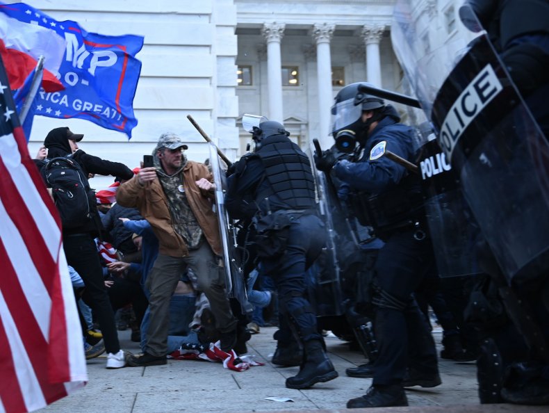 January 6 rioters clash with police