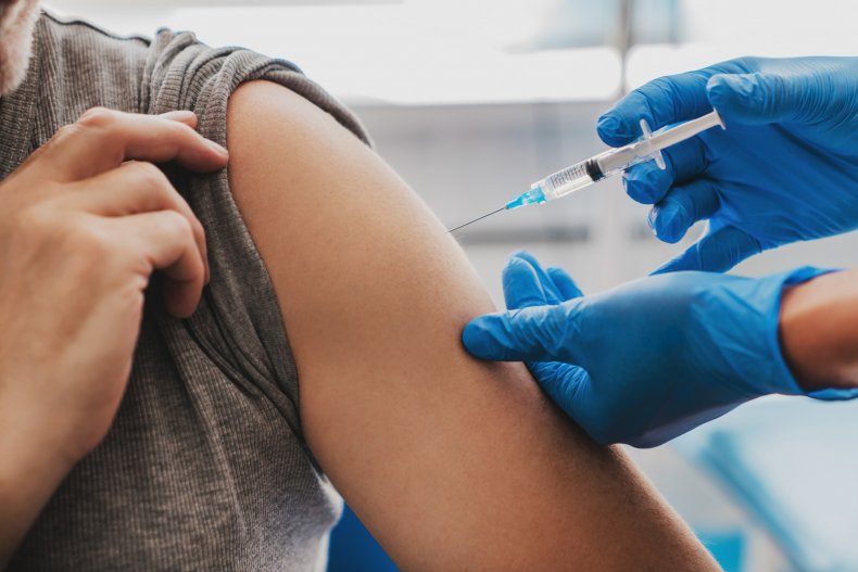 Man receives vaccination in hospital