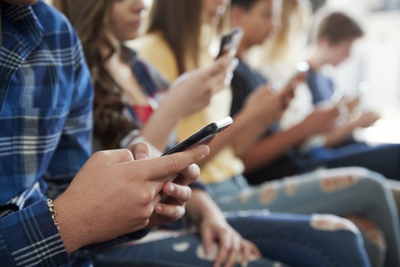 Teenagers using smartphone