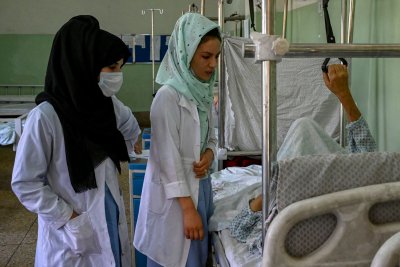 Nurses treat patients at hospital in Kabul