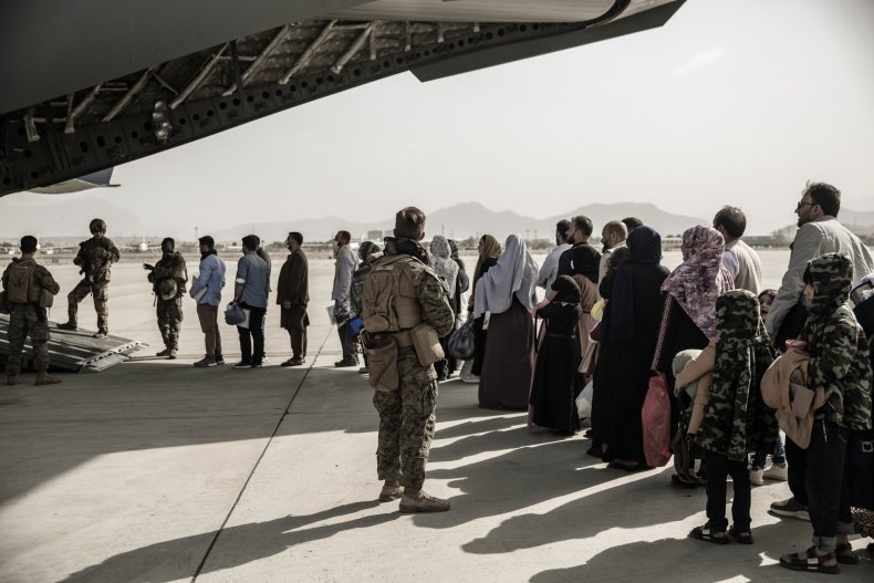 Afghan Evacuees Wait to Board Plane