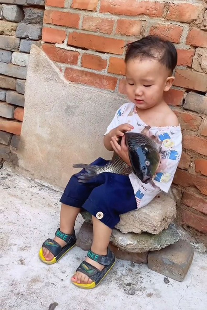 boy with fish