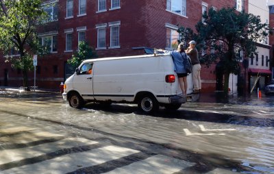 People Navigate Flooded Roads People Navigate Flooded Roads