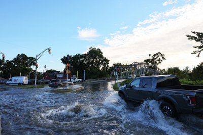 Pick-up Truck in Flooded Street