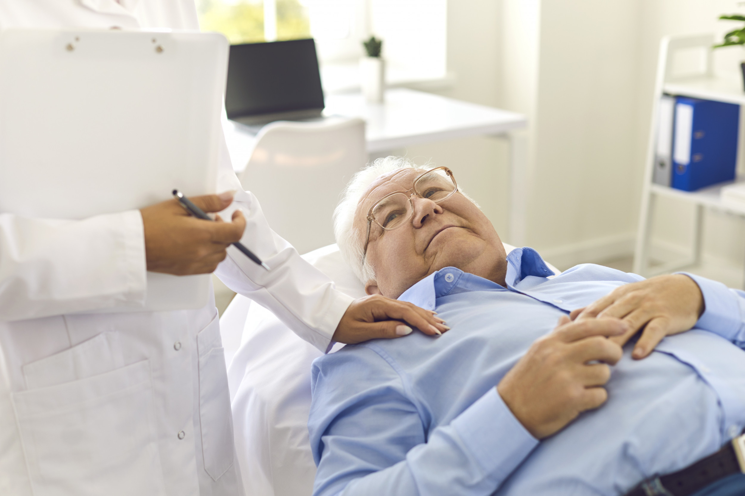 older person getting a checkup