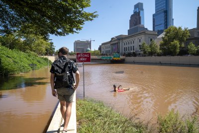 Residents Explore Flooded Expressway Residents Explore Flooded Expressway