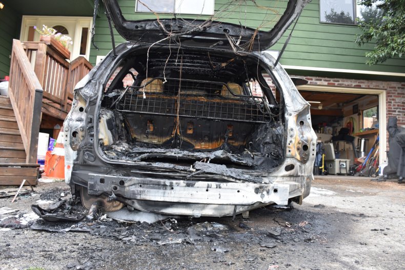A white SUV set on fire