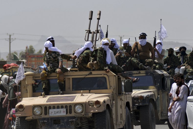 Taliban, parade, weapons, captured, US, Kandahar, Afghanistan