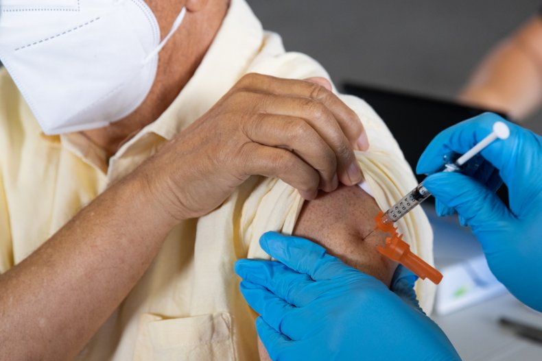 A Patient Receives a Vaccine Booster Shot