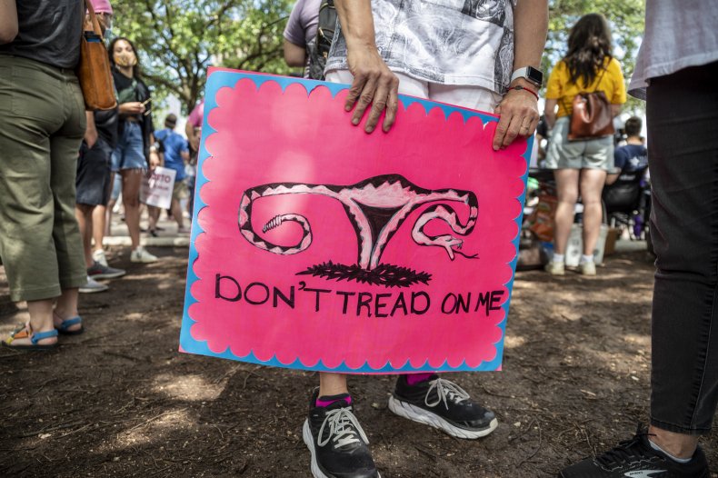 A Texas Protester Holds a Sign