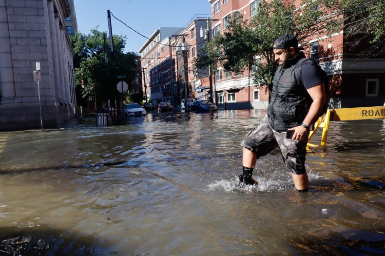 A Man Walks Through Flooded New York