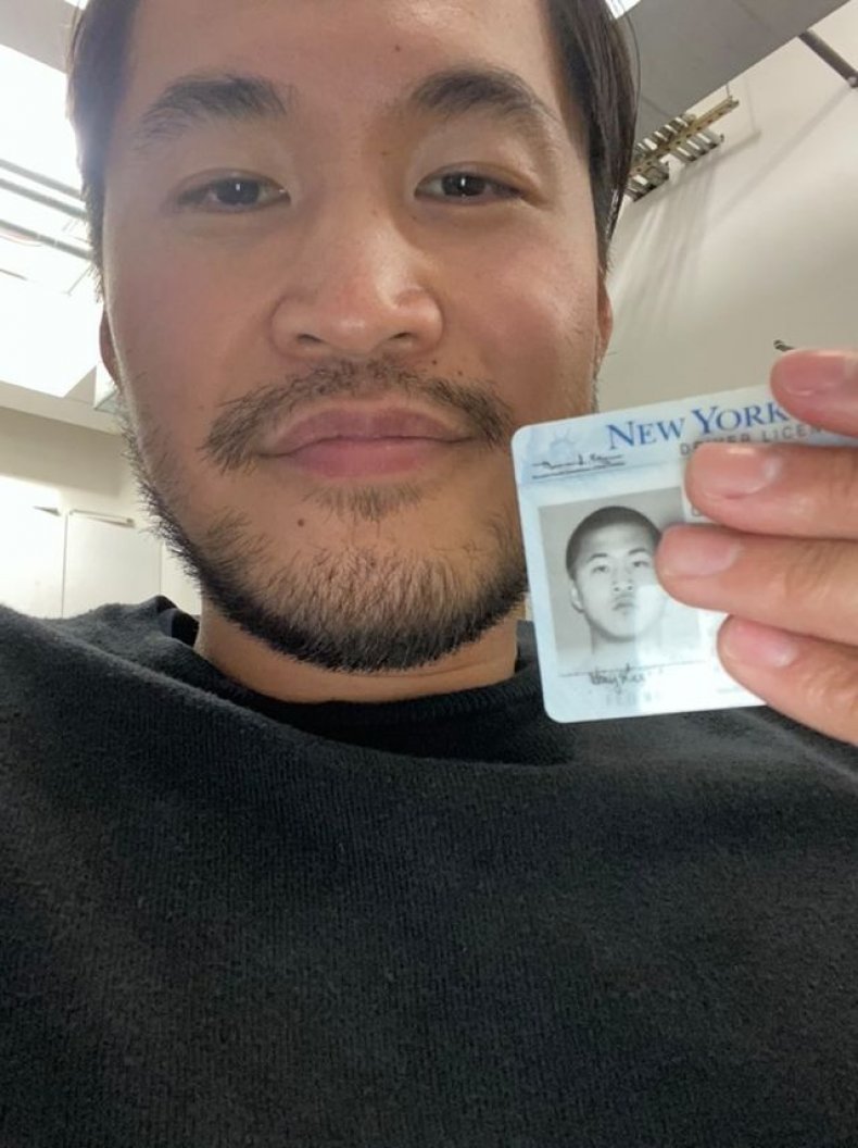 Gary Lee holding ID up to face