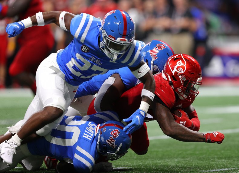 The Louisville Cardinals' Jalen Mitchell Is Tackled