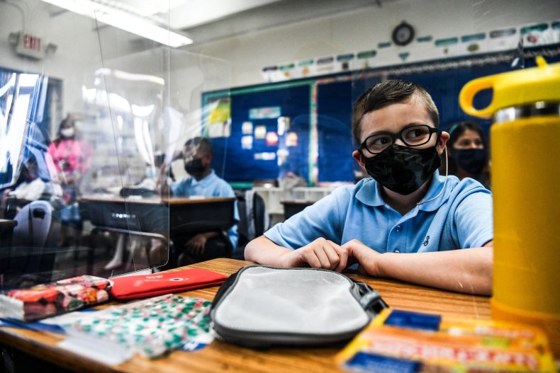 A Student Wears a Mask at School