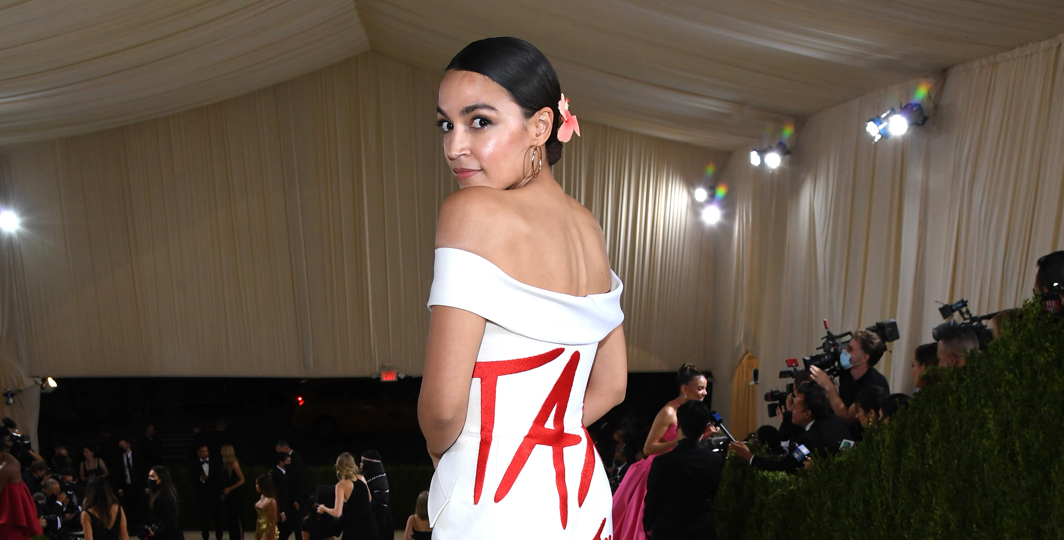 Alexandria Ocasio-Cortez Gets Mixed Reviews for 'Tax the Rich' Dress Worn at Met Gala