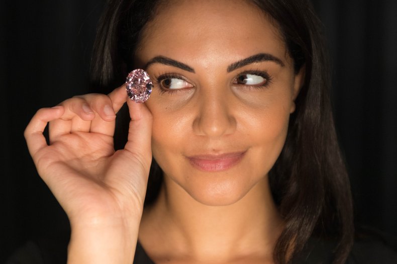 A model displays the "Pink Star" diamond.