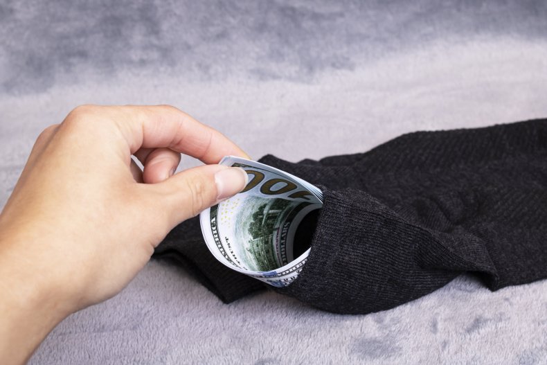 File photo of money in sock. 