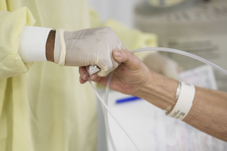 Doctor Holding Patient's Hand