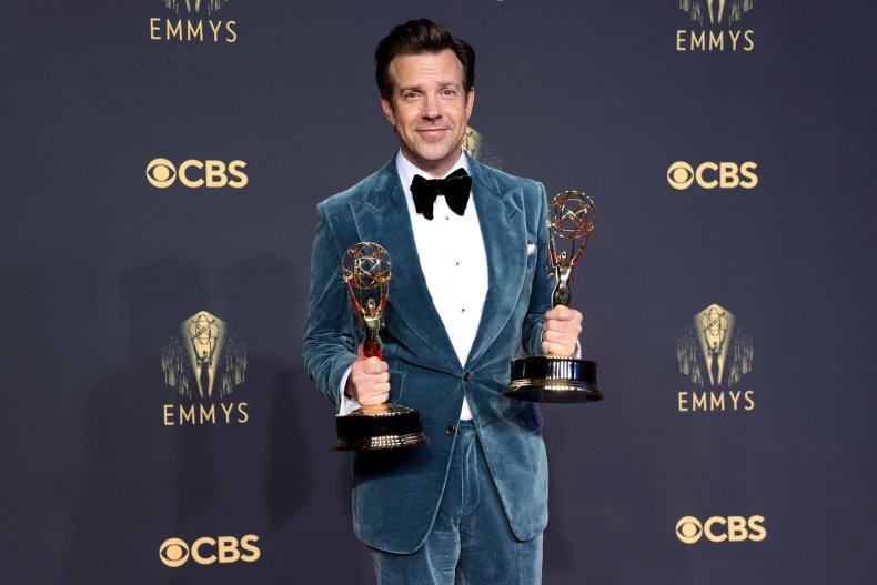 Jason Sudeikis poses with Emmy Awards