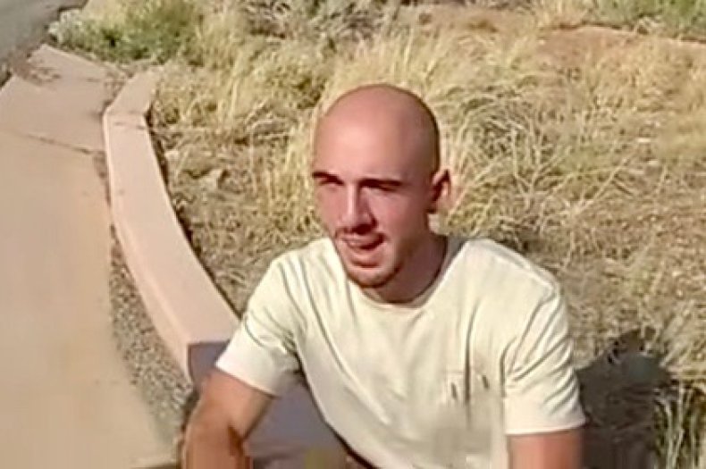 Brian Laundrie sitting by roadside