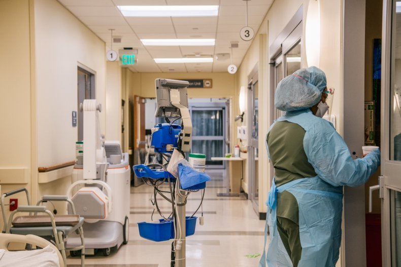 Emergency room nurse gives a patient water