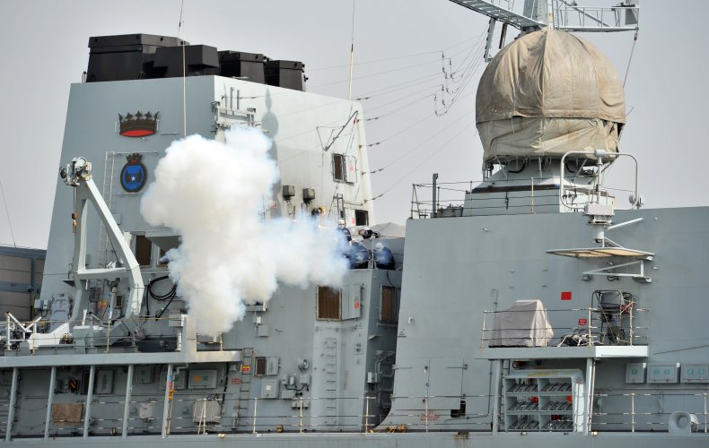 HMS Richmond fires cannon