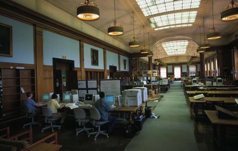 Students work inside Baker Library at Harvard 
