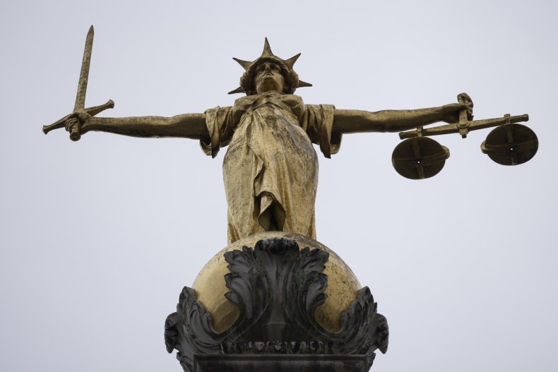 A statue of the Scales of Justice