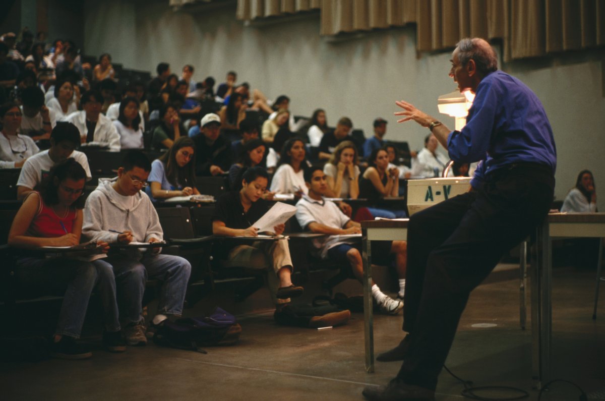 Professor Lecturing Students in Large Hall