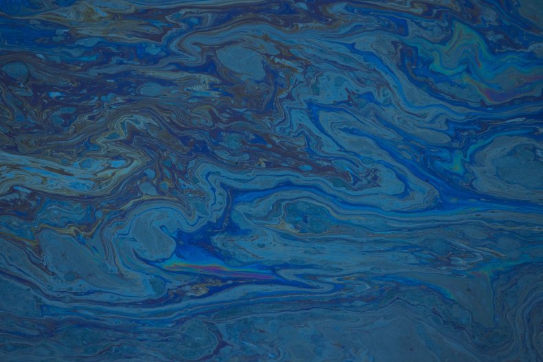Oil floating in water near Huntington Beach.