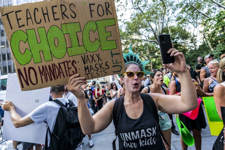 Teachers protest the COVID-19 vaccine mandate