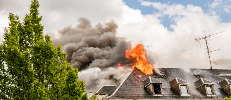 Neighbors Carry Elderly Woman Out of Fire