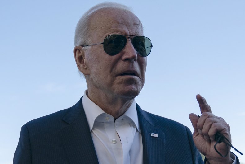 President Joe Biden speaks with reporters
