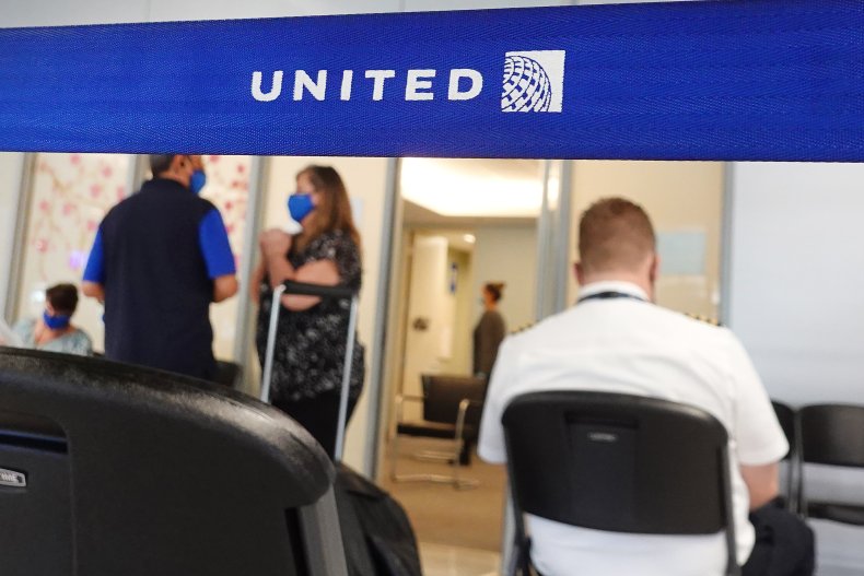 United Airlines workers arrive to receive vaccines